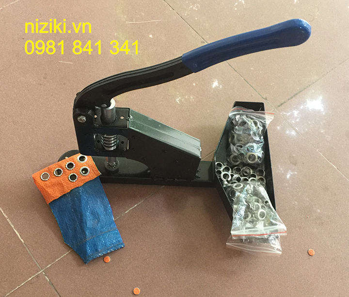 máy đóng khuy bạt